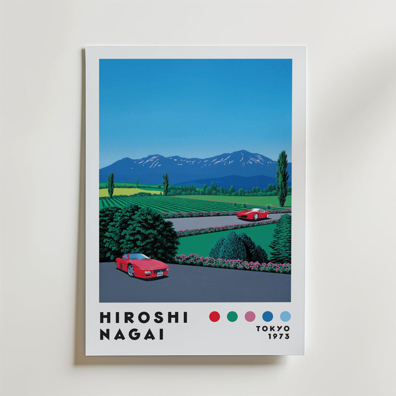 The Bozetto "Hiroshi Nagai Alpine Drive Poster" visar två röda sportbilar på en väg framför gröna fält och alper, med texten "HIROSHI NAGAI" och "TOKYO 1973" - en hyllning till retroestetik.